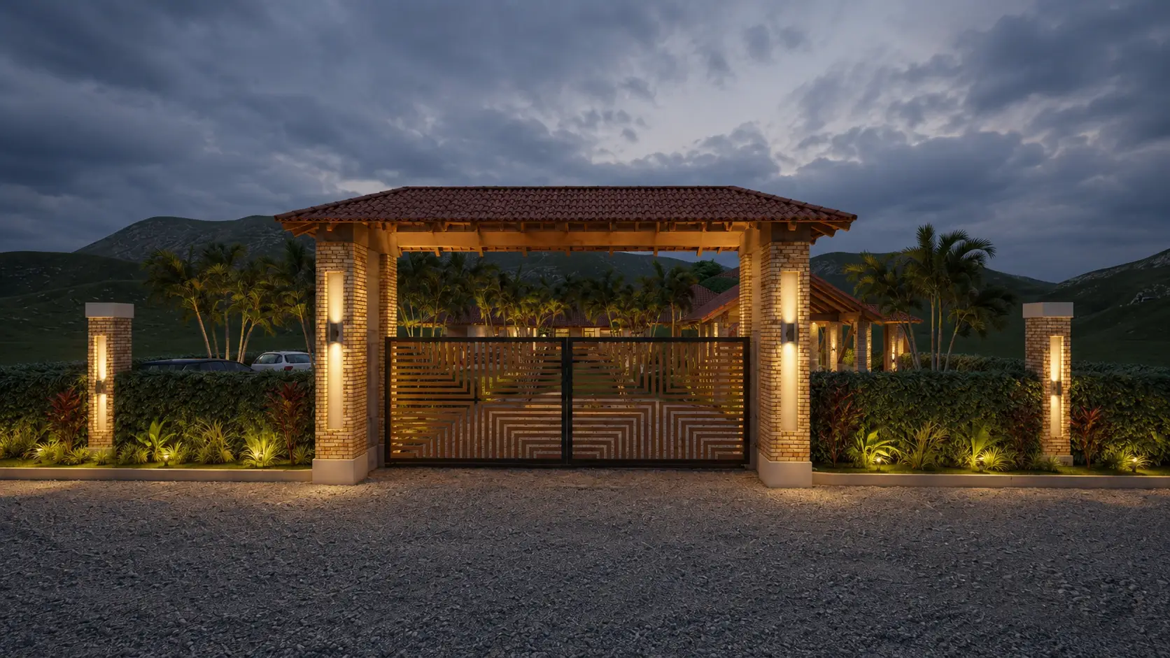 Portal de acceso de Villa Roma iluminado al anochecer, con cubierta en teja y palmeras